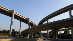 FILE PHOTO: An automobile travels in a carpool lane along the highway system into Los Angeles, California, U.S. August 10, 2017. REUTERS/Mike Blake