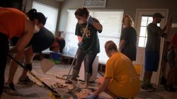 Samaritans help clear debris from the house of a neighbor which was left flooded from Tropical Storm Harvey in Houston, Texas, U.S. September 3, 2017.