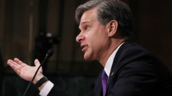 FILE PHOTO: Christopher Wray testifies before a Senate Judiciary Committee confirmation hearing on his nomination to be the next FBI director on Capitol Hill in Washington, U.S., July 12, 2017. REUTERS/Carlos Barria