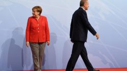 FILE PHOTO: German Chancellor Angela Merkel greets Turkey's President Recep Tayyip Erdogan at the beginning of the G20 summit in Hamburg, Germany, July 7, 2017. REUTERS/Bernd Von Jutrczenka/POOL/File Photo