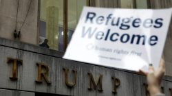 FILE PHOTO: Protesters gather outside the Trump Building at 40 Wall St. to take action against America’s refugee ban in New York City, U.S., March 28, 2017. REUTERS/Lucas Jackson