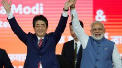 Japanese Prime Minister Shinzo Abe (L) and his Indian counterpart Narendra Modi raise hands after the groundbreaking ceremony for a high-speed rail project in Ahmedabad, India, September 14, 2017. REUTERS/Amit Dave