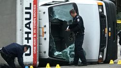 Edmonton Police investigate at the scene where a man hit pedestrians then flipped the U-Haul truck he was driving, pictured at the intersection at 107 Street and 100th Avenue in front of the Matrix Hotel in Edmonton, Alberta, Canada October 1, 2017.