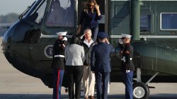 U.S. President Donald Trump salutes as he and first lady Melania Trump arrive to board Air Force One for travel to Puerto Rico, from Joint Base Andrews, Maryland, U.S., October 3, 2017. REUTERS/Jonathan Ernst