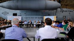U.S. President Donald Trump receives a briefing on hurricane relief efforts in a hangar at Muniz Air National Guard Base in Carolina, Puerto Rico, U.S. October 3, 2017. REUTERS/Jonathan Ernst