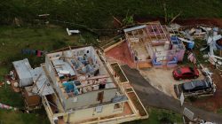 The contents of a damaged home can be seen near the town of Comerio.