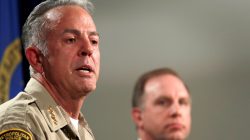 FILE PHOTO - Clark County Sheriff Joe Lombardo responds to a question during a media briefing at the Las Vegas Metro Police headquarters in Las Vegas, Nevada, U.S. October 3, 2017. Aaron Rouse, FBI Special Agent in Charge of the Las Vegas Division, looks on at right. REUTERS/Las Vegas Sun/Steve Marcus