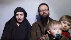 A still image from a video posted by the Taliban on social media on December 19, 2016 shows American Caitlan Coleman (L) speaking next to her Canadian husband Joshua Boyle and their two sons. Courtesy Taliban/Social media via REUTERS