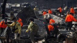 Search and Rescue teams search for two missing people amongst ruins at Journey's End Mobile Home Park destroyed by the Tubbs Fire in Santa Rosa.