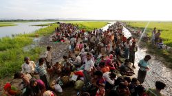 Rohingya refugees who crossed the border from Myanmar a day before, wait to receive permission from the Bangladeshi army to continue their way to the refugee camps, in Palang Khali, Bangladesh October 17, 2017. REUTERS/Jorge Silva