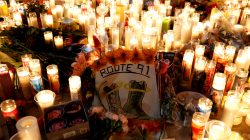 FILE PHOTO: A candlelight vigil is pictured on the Las Vegas strip following a mass shooting at the Route 91 Harvest Country Music Festival in Las Vegas, Nevada, U.S., October 2, 2017. Picture taken October 2, 2017. REUTERS/Chris Wattie/File Photo