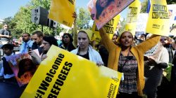 Protesters gather outside the White House for "NoMuslimBanEver" rally against what they say is discriminatory policies that unlawfully target American Muslim and immigrant communities, in Washington, U.S., October 18, 2017. REUTERS/Yuri Gripas