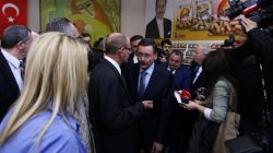 Turkey's ruling AK Party (AKP) mayoral candidate and current Ankara Mayor Melih Gokcek (C) attends an event as part of his election campaign in Ankara March 18, 2014. REUTERS/Umit Bektas