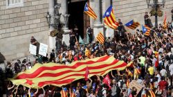 Protestors carrying Catalan seperatist flags gather outside the Generalitat Palace, the regional government headquarters, in Barcelona, Spain, October 26, 2017. REUTERS/Yves Herman