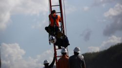 Workers from Montana-based Whitefish Energy Holdings help fix the island's power grid, damaged during Hurricane Maria in September, in Manati, Puerto Rico October 25, 2017. REUTERS/Alvin Baez