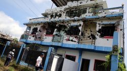 Copies of Koran, boots and scarves all that remain in Philippine rebel leader's lair