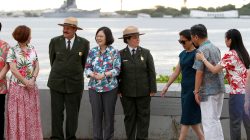 Taiwan's President Tsai Ing-wen, (3rd L), on transit enroute to Pacific island allies, stands with delegates and park service members at the USS Arizona Memorial at Pearl Harbor near Honolulu, Hawaii, U.S. October 28, 2017.
