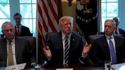 Flanked by Secretary of State Rex Tillerson and Defense Secretary James Mattis, U.S. President Donald Trump meets with members of his cabinet at the White House in Washington, U.S., October 16, 2017.
