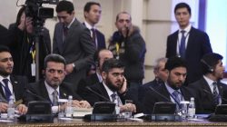 Mohammad Alloush (C), the head of the Syrian opposition delegation, attends Syria peace talks in Astana, Kazakhstan