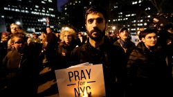 People gather for a candlelight vigil for victims of the pickup truck attack at Foley Square in New York City, U.S., November 1, 2017
