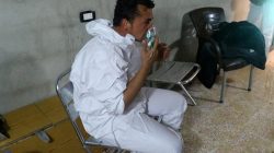 A man breathes through an oxygen mask, after what rescue workers described as a suspected gas attack in the town of Khan Sheikhoun in rebel-held Idlib, Syria April 4, 2017.