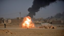 Shi'ite Popular Mobilization Forces (PMF) fighters fire a cannon against Islamic State militants in Al-Qaim, Iraq November 3, 2017.