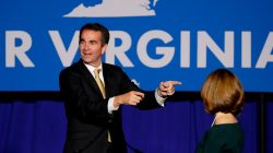 Democrats win bitter Virginia governor's race in setback for Trump