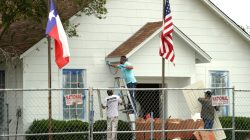 Workers make repairs and paint the site of the shooting at the First Baptist Church of Sutherland Springs, Texas, U.S. November 9, 2017