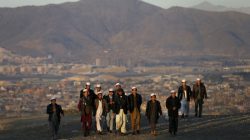 People climb up a hill to watch the sunset in Kabul, Afghanistan November 16, 2015. REUTERS/Mohammad Ismail