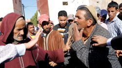 People gather at the place where 15 people were killed when a stampede broke out in the southwestern Moroccan town of Sidi Boulaalam as food aid was being distributed in a market, in Sidi Boullaalam, Morocco November 20, 2017.