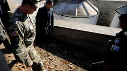 South Korean Defence Minister Song Young-moo looks around a spot where a North Korean collapsed wounded by gun shot by North Korean soldiers while crossing the border on November 13, at the truce village of Panmunjom inside the demilitarized zone, South Korea, November 27, 2017.