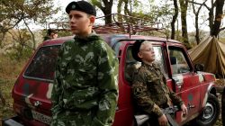 As West frowns on Putin, young Russians learn the military way