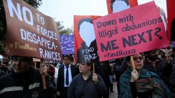 Demonstrators hold placards calling for the release of Raza Mehmood Khan, a member of Aghaz-i-Dosti (Start of Friendship), a group that works on peace building between Pakistan and India, during a protest in Lahore, Pakistan December 11, 2017.
