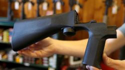 An example of a bump stock that attaches to a semi-automatic rifle to increase the firing rate is seen at Good Guys Gun Shop in Orem, Utah, U.S. on October 4, 2017.