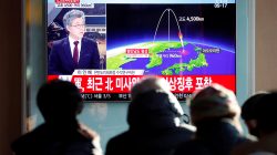 People watch a television broadcast of a news report on North Korea firing what appeared to be an intercontinental ballistic missile (ICBM) that landed close to Japan, in Seoul, South Korea, November 29, 2017