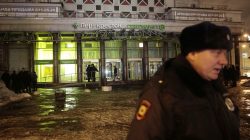 A policeman stands guard near a supermarket after an explosion in St Petersburg, Russia December 27, 2017.