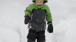Silas Stueve plays in the snow after two days of record-breaking snowfall in Erie, Pennsylvania, U.S., December 27, 2017.