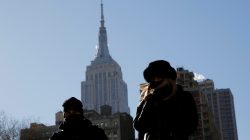 People walk along Sixth Avenue as a cold weather front hits the region in Manhattan, New York, U.S., December 28, 2017.
