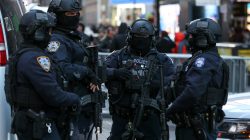 New York Police Department Counterterrorism Bureau members stand in Times Square to provide security ahead of New Year's Eve celebrations in Manhattan, New York, U.S. December 28, 2017