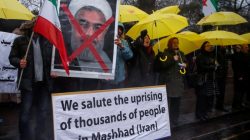 Opponents of Iranian President Hassan Rouhani hold a protest outside the Iranian embassy in west London, Britain December 31, 2017.