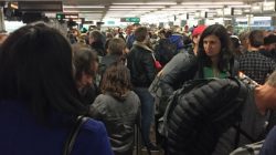 People queue at the immigration lines during a systems outage at Sea-Tac Airport in Seattle, Washington, U.S. in this January 1, 2018 picture obtained from social media