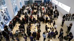 Customers arrive to purchase an iPhone X at an Apple store in New York, U.S., November 3, 2017.