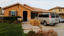 A van sits parked on the driveway of the home of David Allen Turpin and Louise Ann Turpin in Perris, California, U.S. January 15, 2018.