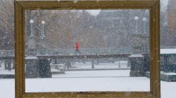 Snow falls through a picture frame in the Boston Public Garden during a winter storm in Boston, Massachusetts, U.S., January 17, 2018.