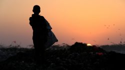 Ayoub Mohammed Ruzaiq, 11, stands in a garbage dump where he collects recyclables and food near the Red Sea port city of Hodeidah, Yemen, January 13, 2018.