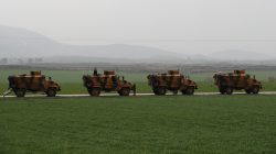 Turkish army vehicles are pictured near the Turkish-Syrian border in Hatay province, Turkey January 23,