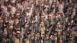 Fighters from the self-defence forces of the Kurdish-led north hold their weapons during a rally in Hasaka, northeastern Syria. REUTERS/Rodi Said