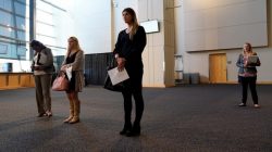 Job seekers listen to a presentation at the Colorado Hospital Association job fair in Denver, Colorado, U.S., October 4, 2017.