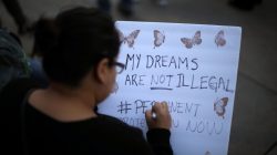 A woman protests to call for a new DREAM Act to replace DACA in Los Angeles, California U.S. January 17, 2018.