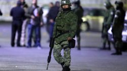 A soldier stands guard next to a crime scene, where men were killed inside a home by unknown assailants, in the municipality of San Nicolas de los Garza, Mexico, January 27, 2018. Picture taken January 27, 2018.